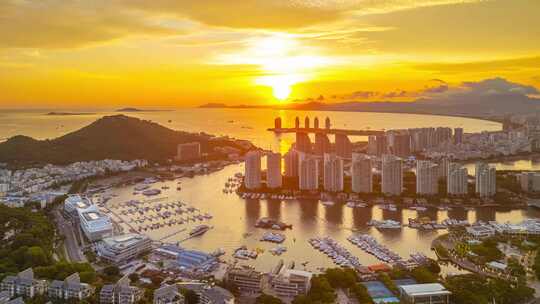 海南三亚三亚湾日落晚霞璀璨自贸港城市延时