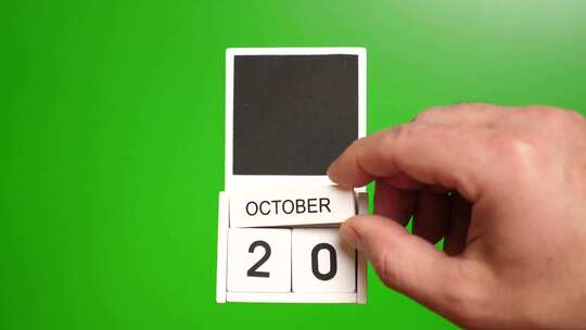 10.绿色背景上日期为10月20日的日历