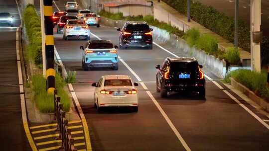 夜晚快速路隧道口车流马路行车亮化