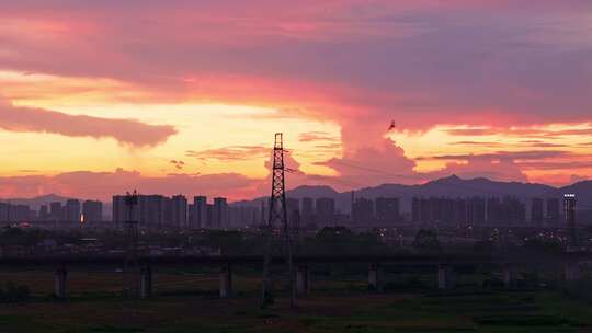 夕阳电塔城市航拍