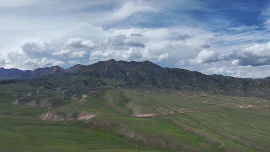 航拍新疆赛里木湖风景区北麓山坡夏季风景