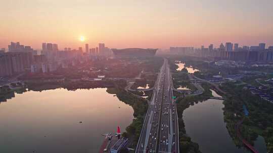 成都环球中心锦城湖公园和绕城高速日出航拍