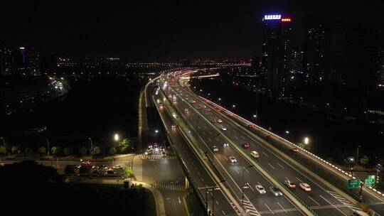 航拍夜晚下的杭州城市高架桥
