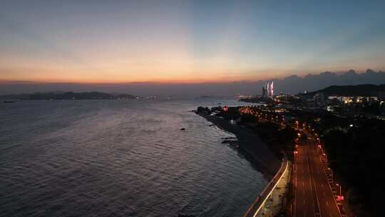 厦门夜景环岛路航拍海滨城市风光双子塔晚霞视频素材模板下载