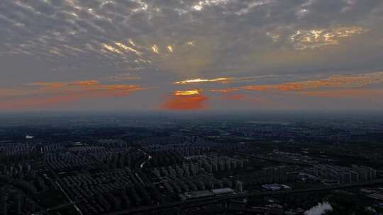 航拍火力发电夕阳延时城市晚霞丁达尔光效