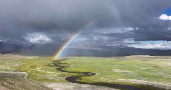 航拍西藏日喀则佩枯错日间彩虹风光