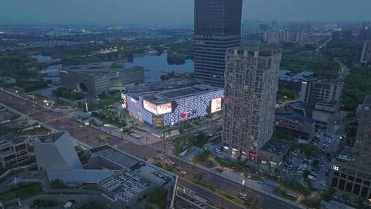 上海嘉定新城TSF购物中心夜晚航拍视频素材模板下载