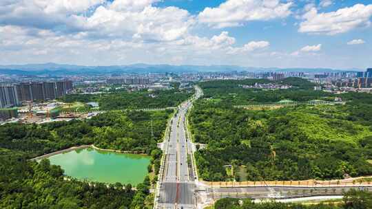 高空俯瞰青山绿水间的建筑 永康城市道路