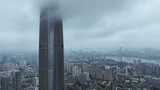航拍雨后云雾缭绕的湖北武汉绿地中心大厦高清在线视频素材下载