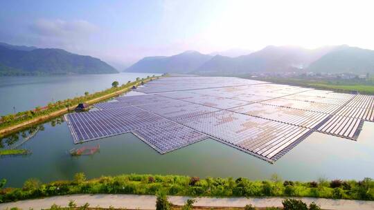 航拍河边光伏太阳能电池板