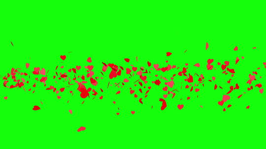 绿色屏幕上的红色心形纸屑