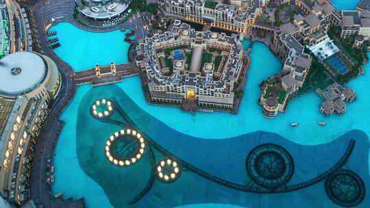 夜景中哈利法塔附近的迪拜喷泉水光表演视频素材模板下载