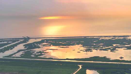 金色日出上海崇明岛东滩湿地全景