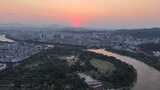 航拍广西百色日落晚霞夕阳高清在线视频素材下载
