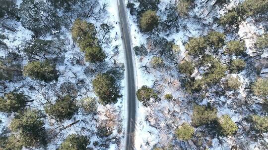 冬天雪景航拍林海雪原公路