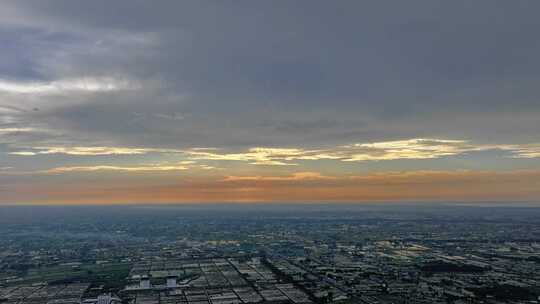 航拍火力发电夕阳延时城市晚霞丁达尔光效