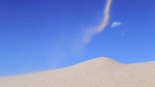 倾倒沙子到沙丘