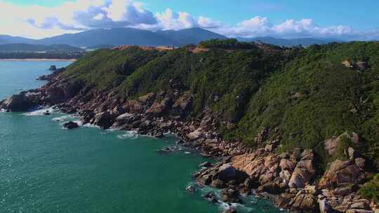 航拍海南三亚西岛海洋文化旅游区海浪礁石