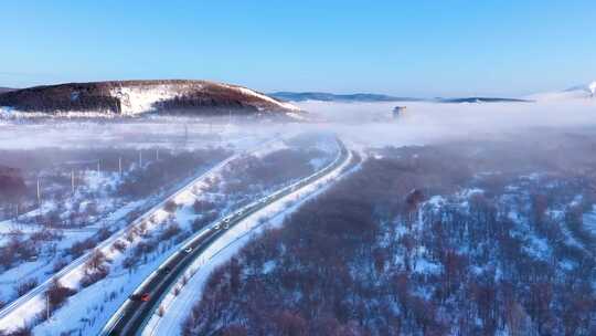 航拍穿越林海雪原的332国道241202-1