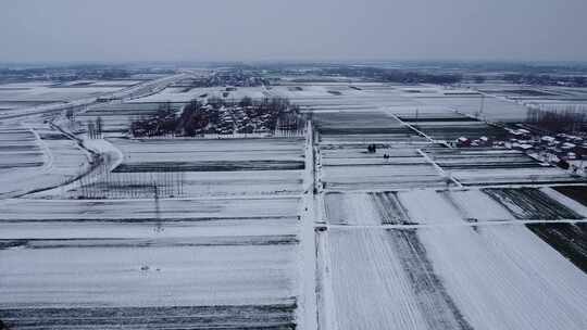 航拍冬天村庄雪景视频素材模板下载