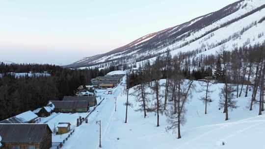 航拍新疆冬季喀纳斯湖雪景雪山森林冰河寒冷