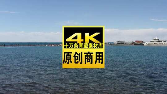 青海海南青海湖碧水天空飞鸟航拍视频高清在线视频素材下载