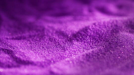 紫色沙子被风吹起美妆抽象镜头