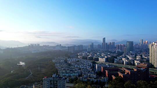 阳光照耀山水深圳城市高楼道路交通A视频素材模板下载