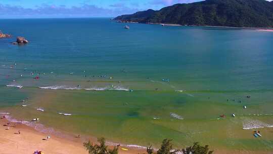 航拍三亚后海皇后湾冲浪及海棠湾海岛海浪