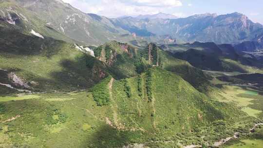 青海果洛州蓝天白云山峰航拍4k视频