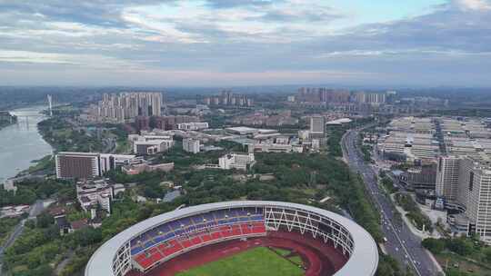 城市高空俯瞰体育场及周边建筑泸州奥体中心