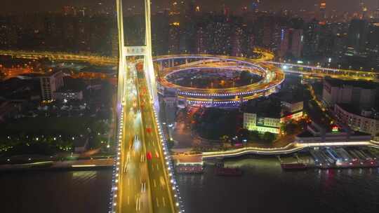 上海市黄浦区黄浦江南浦大桥夜晚夜景车流航视频素材模板下载