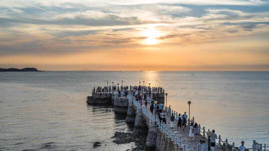 栈桥海边夕阳晚霞延时摄影