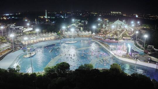 航拍高视角鸟瞰上海松江玛雅水上乐园夜景