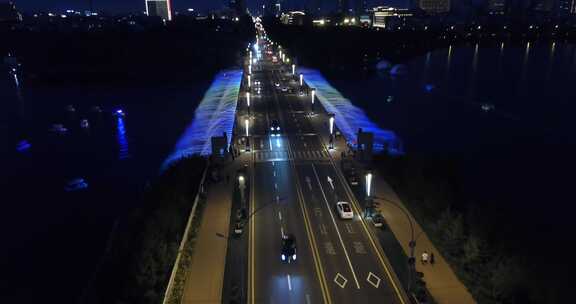长春南湖公园音乐喷泉彩虹南湖大桥夜景航拍
