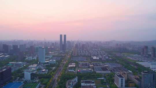 日出晨曦中的杭州滨江城市建筑风景航拍