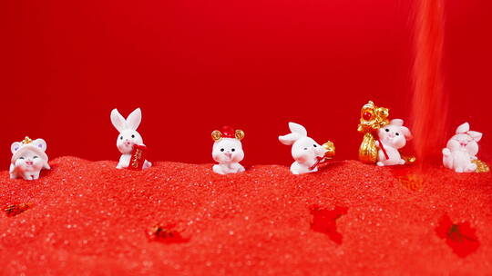 喜庆红沙上可爱兔玩具视频素材模板下载