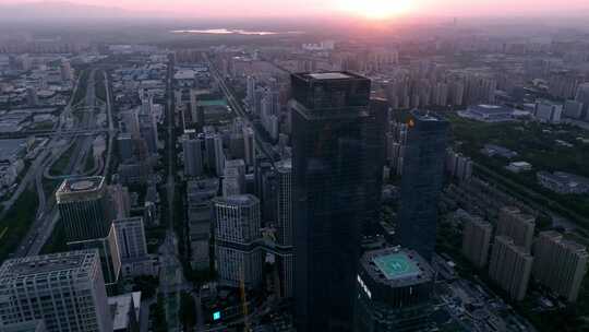 西安高新区都市之门夕阳照射建筑群