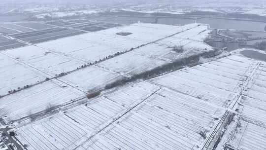航拍农村乡镇集镇平原雪景视频素材模板下载