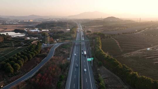 航拍夕阳下的高速公路