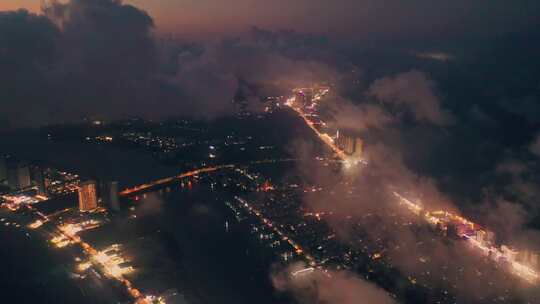 航拍夜景下的惠州市惠东双月湾