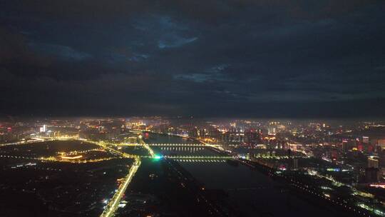 城市航拍洛阳阴雨天后城市云海夜景建筑