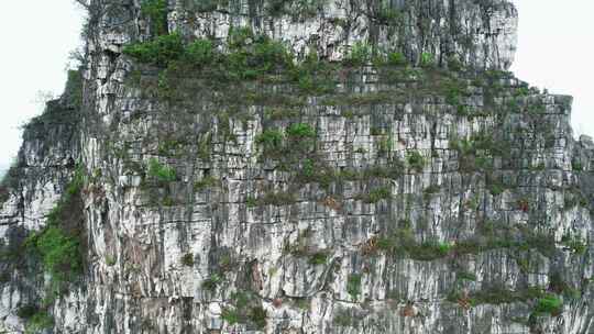 广西桂林哈斯特地貌山崖绝壁航拍视频素材模板下载