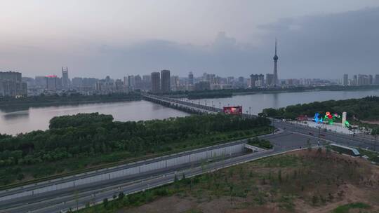 城市航拍洛阳城市地标落日交通经济发展航拍