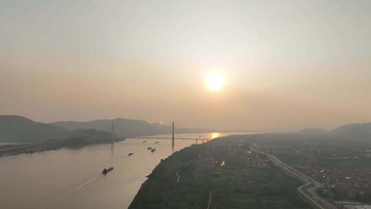 长江日落风光航拍武穴江边风景河流黄昏夕阳