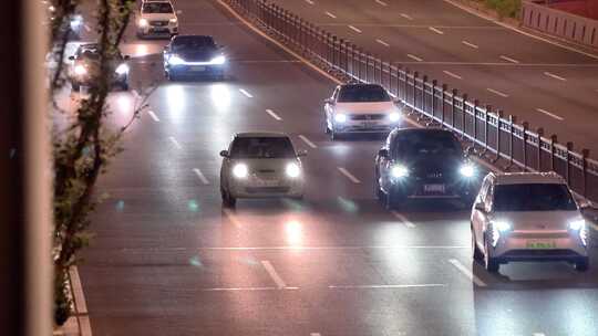 夜晚快速路隧道口车流马路行车亮化