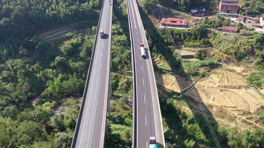 高速公路汽车进出隧道航拍高架桥货车高速路视频素材模板下载