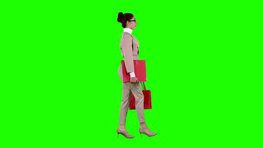 绿幕背景前女人在行走视频素材模板下载