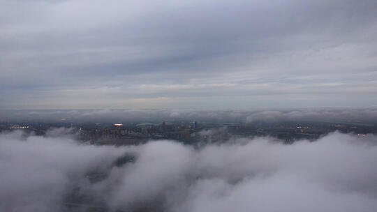 航拍云雾之上的城市风光视频素材模板下载