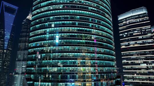 现代建筑夜晚灯光通明白领加班-上海陆家嘴视频素材模板下载